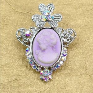 Cameo pin brooch in light purple with crystals and flower design on top   New
